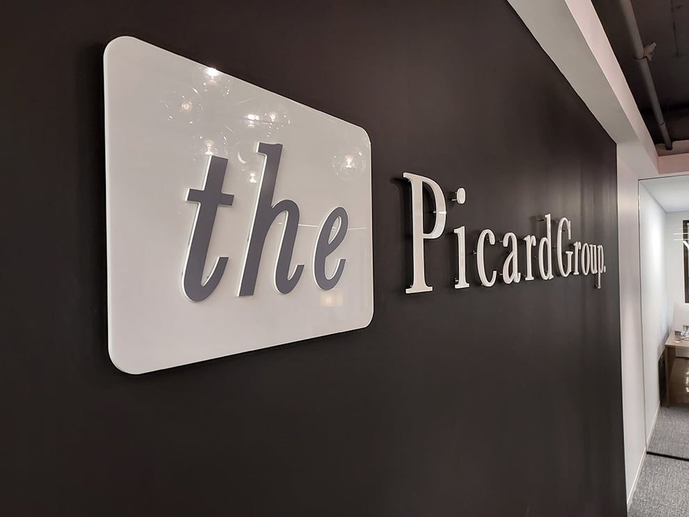 Acrylic Signs in Richmond, VA designed and installed for business office walls and branded interiors