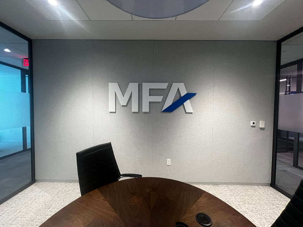 Dimensional Letters in Arlington, VA designed and installed for hallway and directional wall signage