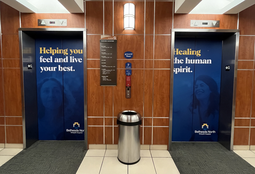 Elevator Wraps in Columbia, MD designed and installed for office cab walls and elevator doors