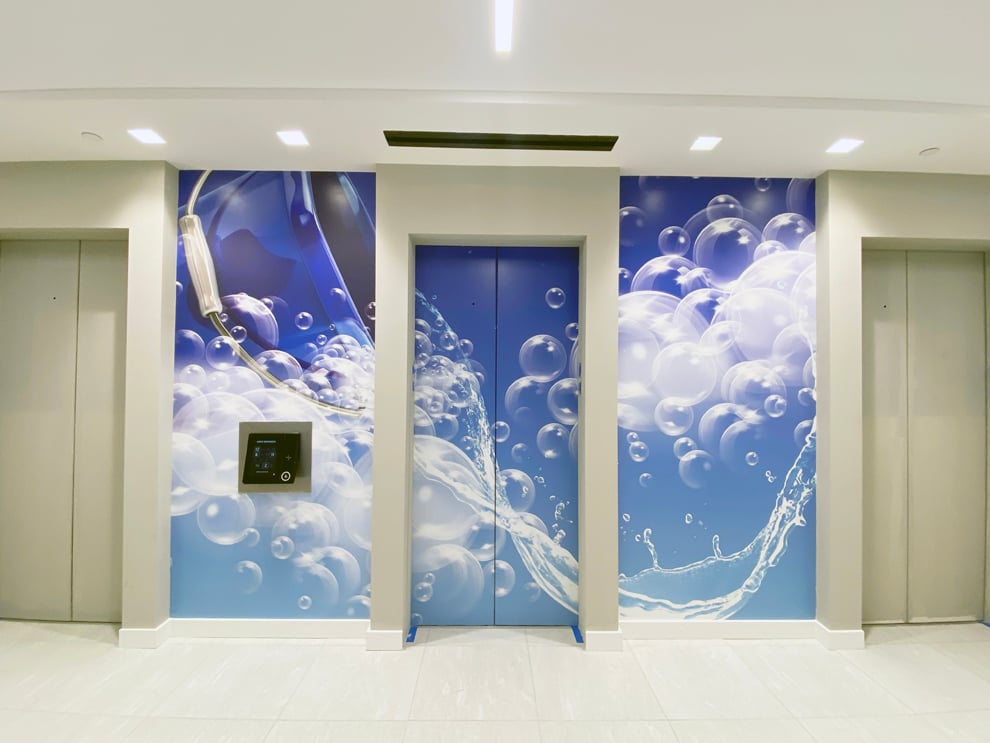 Elevator Wraps in Richmond VA designed and installed for elevator door graphics and workplace branding