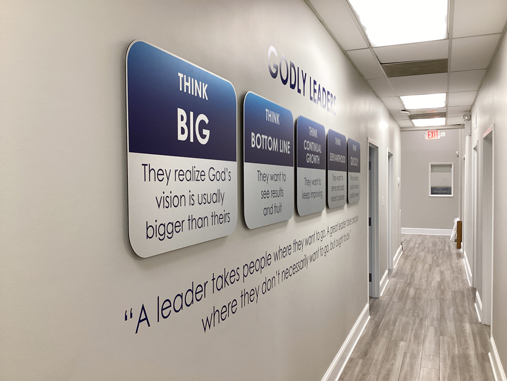 Workplace wall wraps and signage created through environmental graphic design in Baltimore, MD