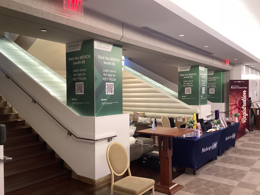 Event signs with promotional graphics for conferences in Bethesda, MD
