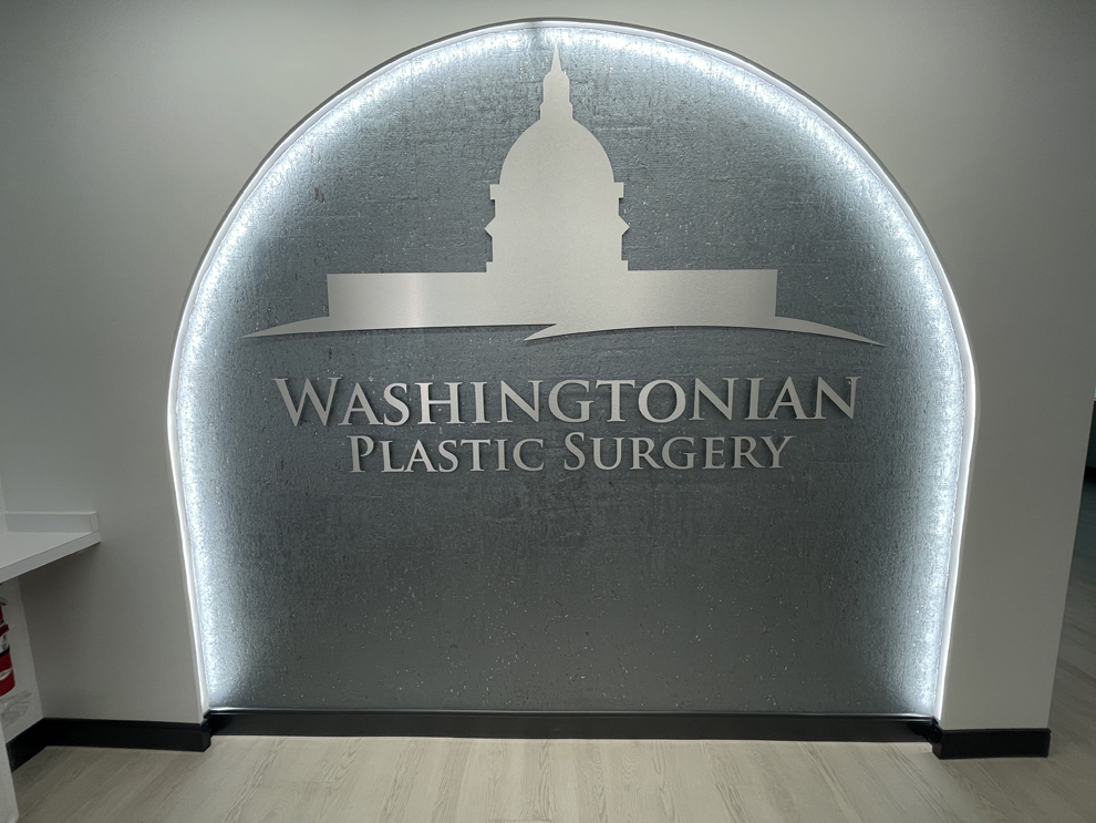 Sign Company Arlington, VA designed and installed business interior signage for corporate identity