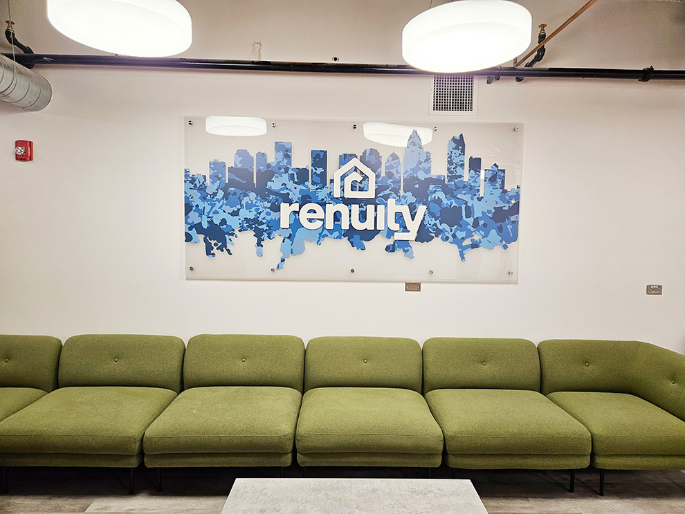 Lobby Signs Arlington VA designed and installed with standoff-mounted acrylic for office interiors