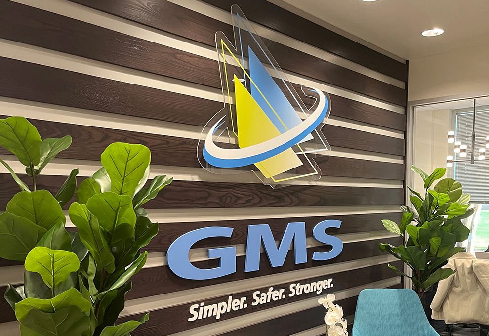 Lobby Signs Norfolk VA designed and installed with branded wall graphics for office reception areas