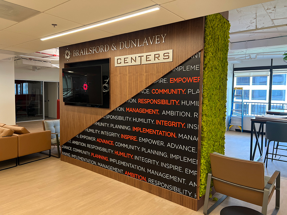 Lobby Signs Reston VA designed and installed to modernize corporate lobby environments