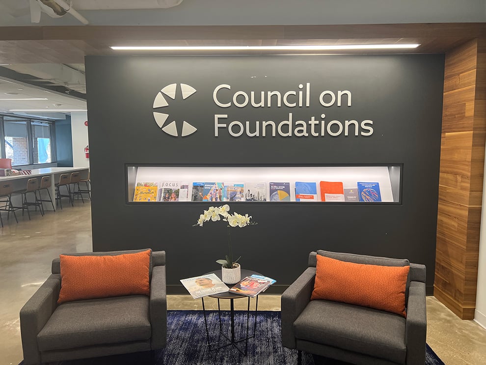 Lobby Signs Cary NC designed and installed with custom lettering for reception wall branding