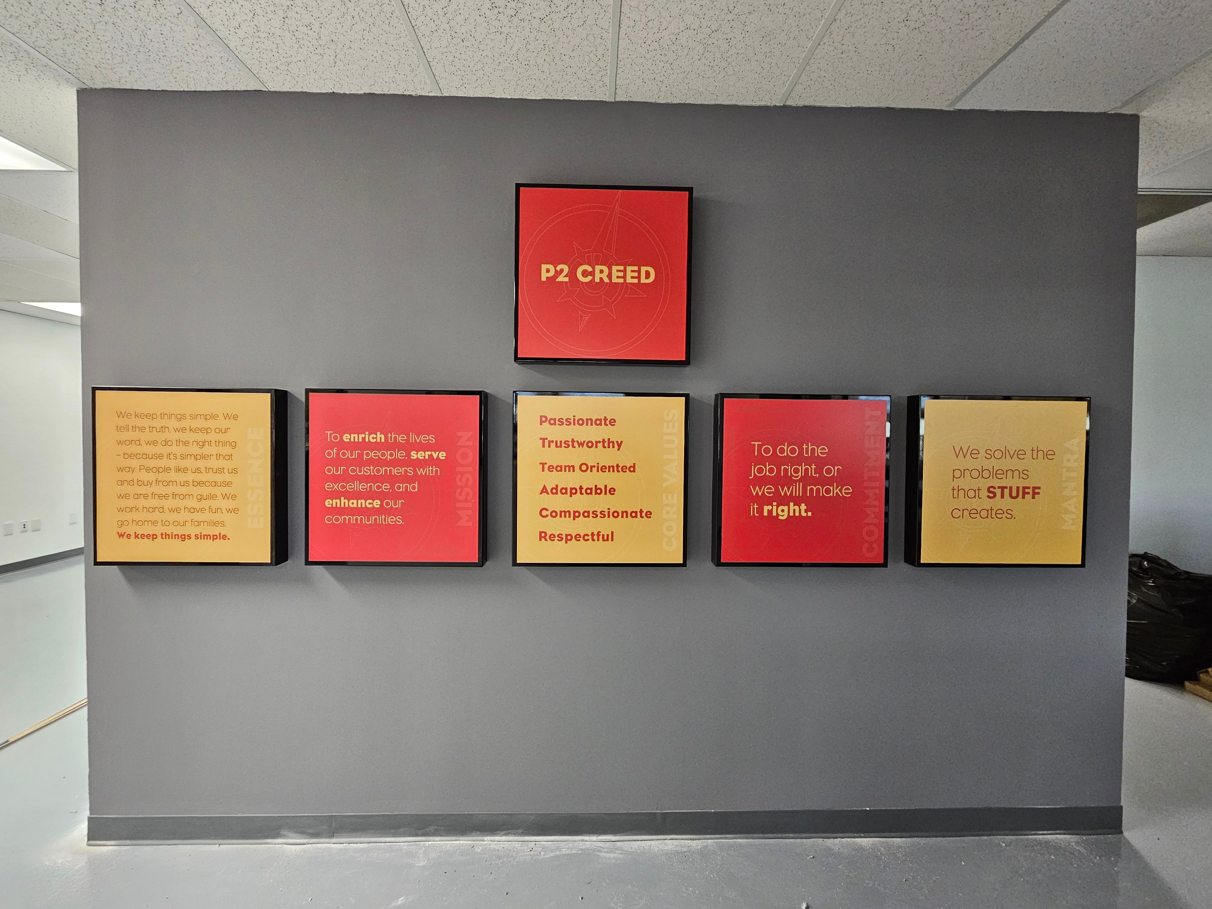 Corporate mission statement wall display installed in Baltimore, MD office