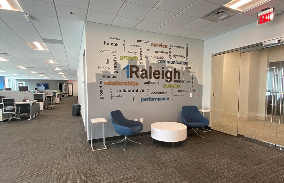 Branded mission statement wall display highlighting business values Richmond, VA