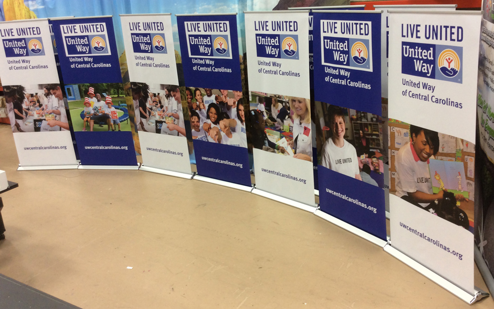 Custom retractable banner stand for workplace branding in Norfolk, VA