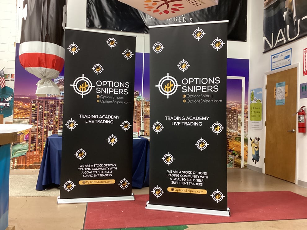 Portable retractable banner stand installed for office branding Richmond, VA
