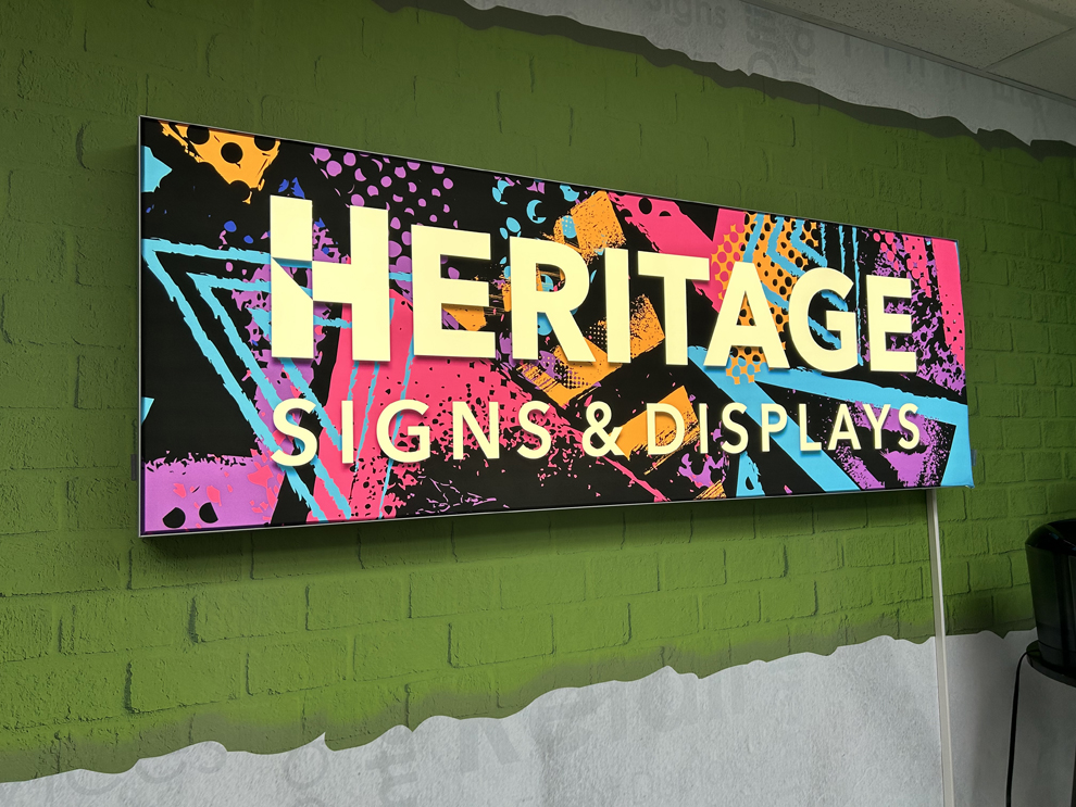 Custom SEG fabric graphics with lightbox display for events in Alexandria, VA