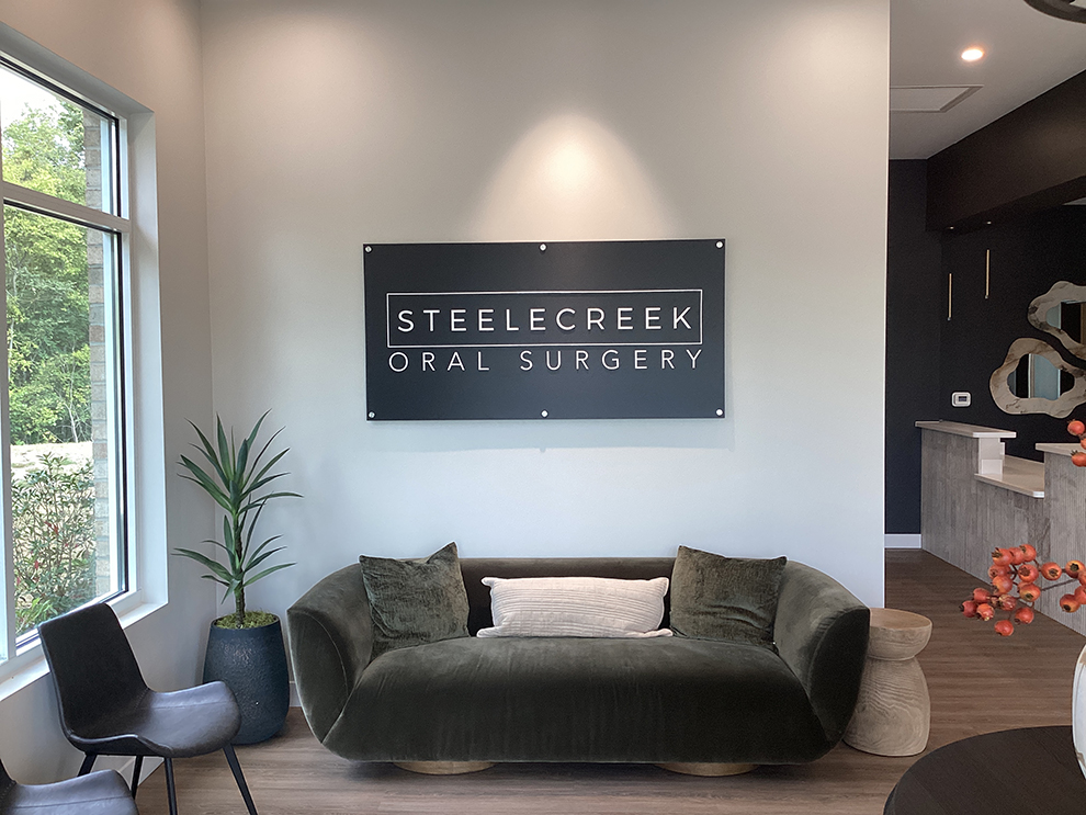 Standoff Mounted Signs in National Harbor, MD designed and installed for corporate office interiors and brand enhancement