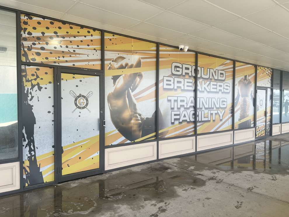 Custom storefront graphics and interior signage for business near Columbia, MD