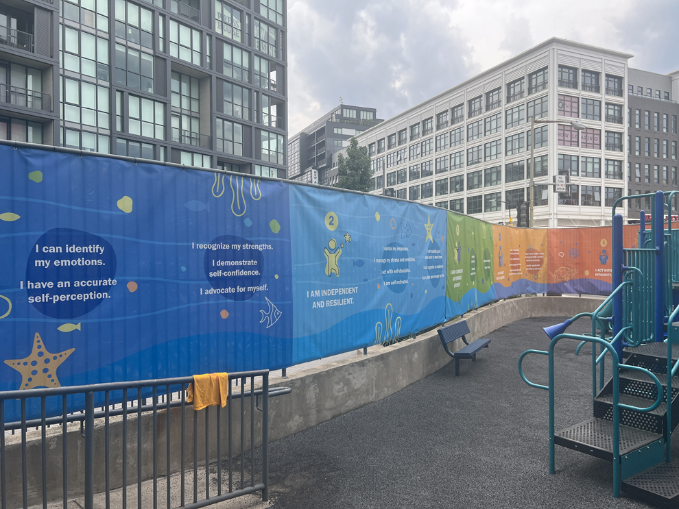 Mesh fence wraps and large vinyl banners installed in Baltimore, MD
