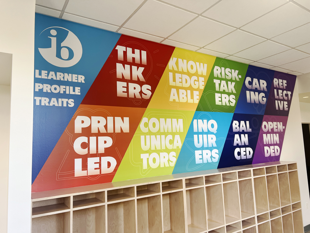 Office lobby wall wrap design for workplace branding in Gaithersburg, MD