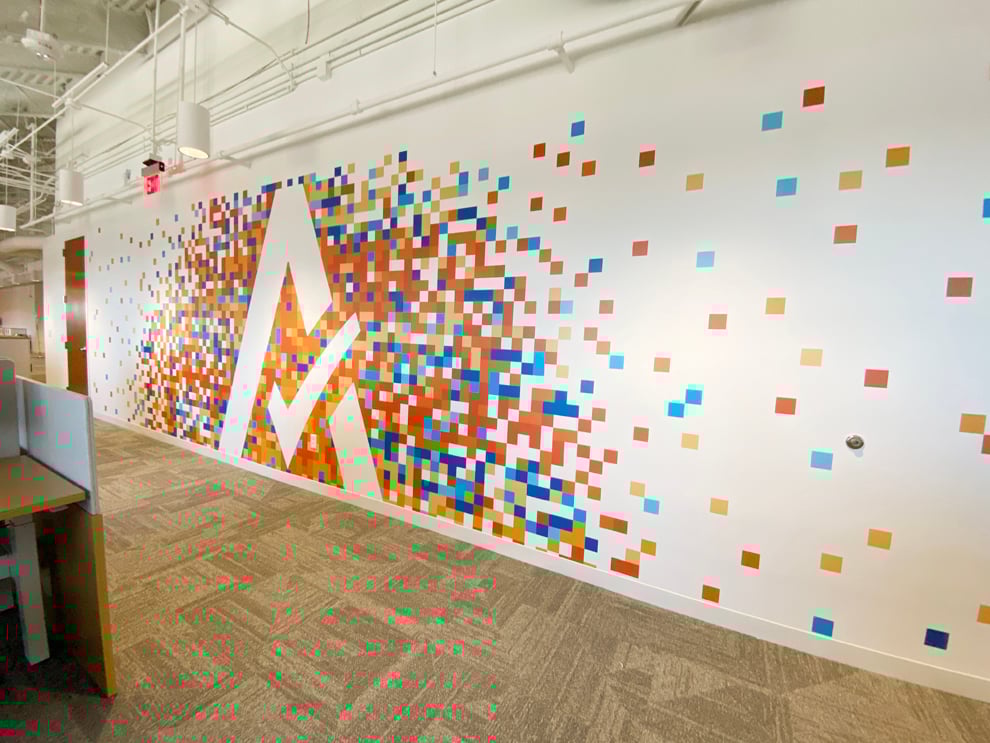 Reception area wall mural with custom branding Reston, VA office
