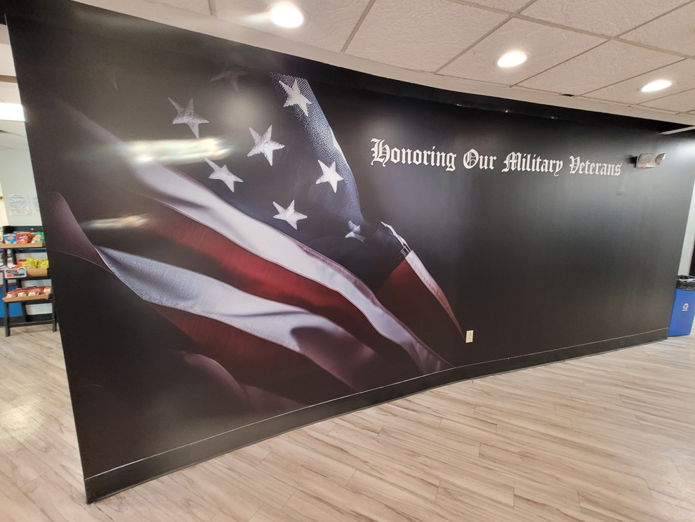 Corporate office wall mural with branding elements in Virginia Beach, VA