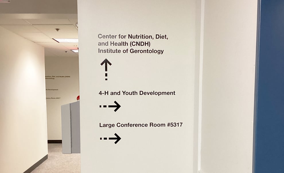 Workplace and office interiors with branded wayfinding signs in Arlington, VA