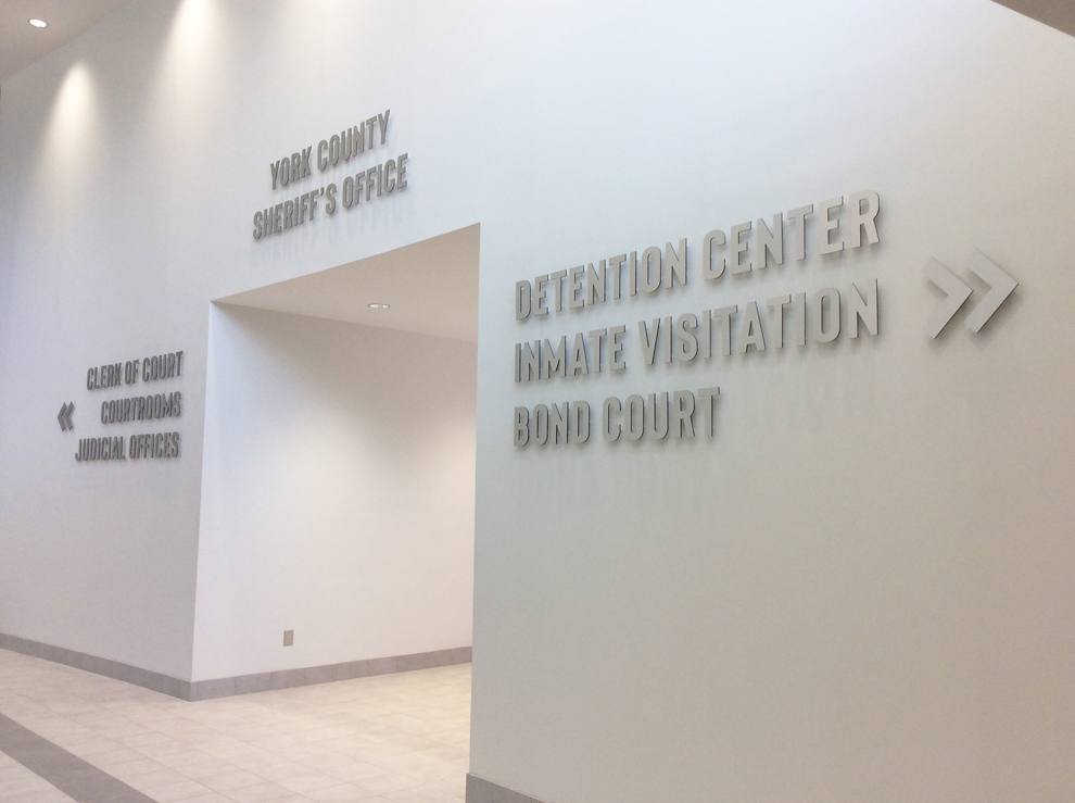 Branded wayfinding signs installed for office environments in Rockville, MD