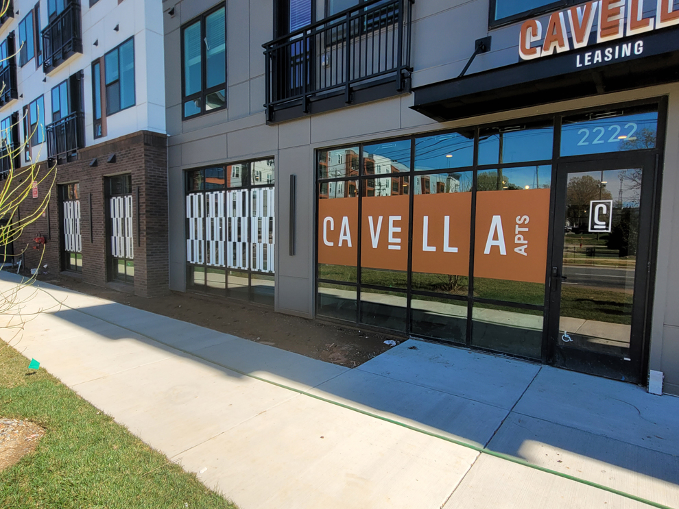 Window Graphics in Fairfax, VA designed and installed with perforated film for storefront visibility