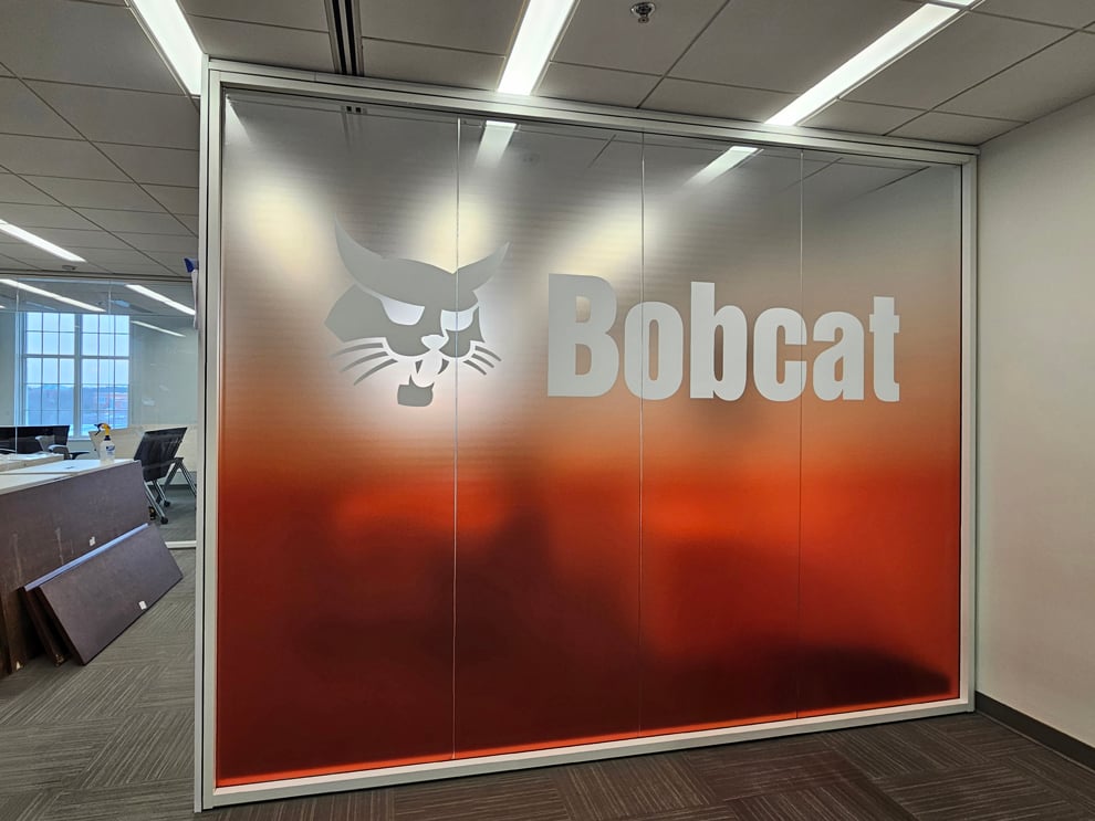 Window Graphics in Richmond, VA designed and installed with frosted vinyl for workplace interiors