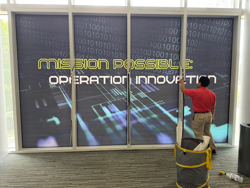 Professional office sign installation with custom graphics in Washington, DC