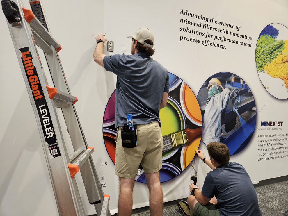 Branded wall graphics and sign installation in Baltimore, MD workplace