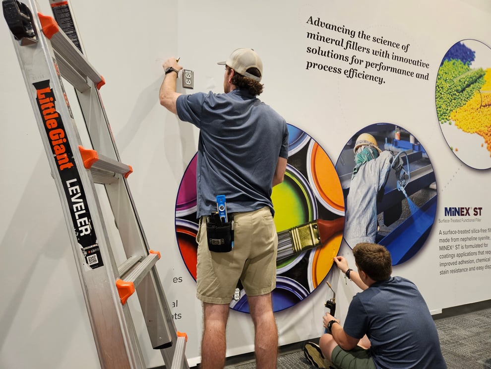 Branded wall graphics and sign installation in Norfolk, VA workplace